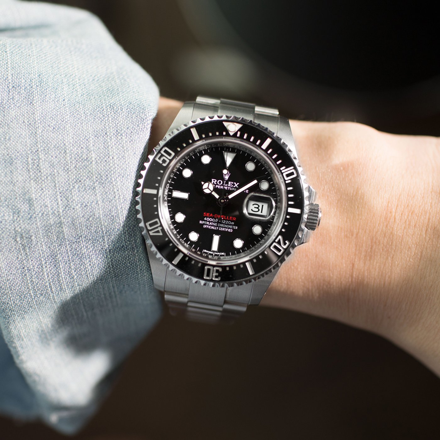 ساعة رجالية Sea Dweller خلفية سوداء 126600-0001