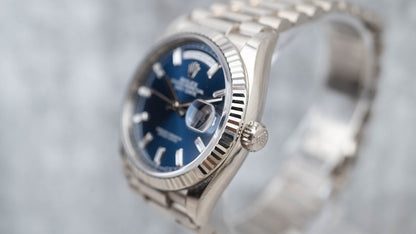 Rolex Day-Date 36 President White Bright Blue Baguette Dial 128239