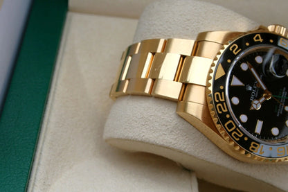 Rolex GMT-Master II 116718LN Yellow Gold Black Dial Oyster